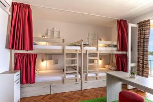 Postel nebo postele na pokoji v ubytování Hostel Casa La Cha
