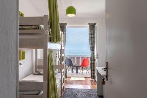 Postel nebo postele na pokoji v ubytování Hostel Casa La Cha