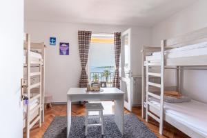 Postel nebo postele na pokoji v ubytování Hostel Casa La Cha