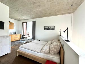a bedroom with a large bed in a room at Cologne Country Lodge in Cologne