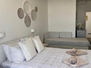 A bed or beds in a room at Vavanos Studios