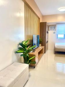 A bed or beds in a room at Classy Studio Unit at Aspira Towers