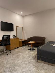 TV a/nebo společenská místnost v ubytování Hotel 5092