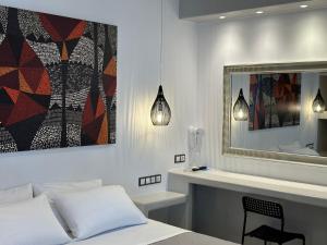 Voodi või voodid majutusasutuse Aphrodite Hotel & Apartments toas
