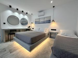 Voodi või voodid majutusasutuse Aphrodite Hotel & Apartments toas