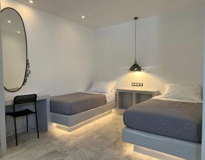 Voodi või voodid majutusasutuse Aphrodite Hotel & Apartments toas
