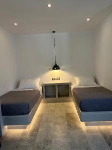 Voodi või voodid majutusasutuse Aphrodite Hotel & Apartments toas