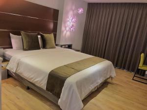 Katil atau katil-katil dalam bilik di Shange Beach Club Homeatay
