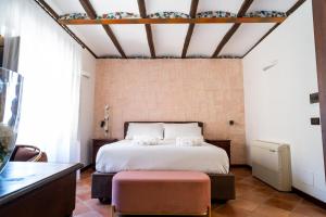 Postel nebo postele na pokoji v ubytování Villa Vittoria Hotel