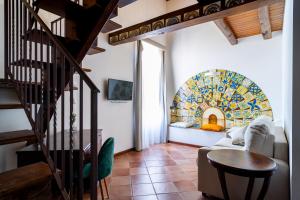 TV a/nebo společenská místnost v ubytování Villa Vittoria Hotel