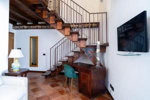 TV a/nebo společenská místnost v ubytování Villa Vittoria Hotel