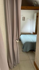 Postel nebo postele na pokoji v ubytování L'Orme Seul, Maison d'hôtes