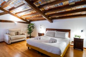 Postel nebo postele na pokoji v ubytování Villa Vittoria Hotel