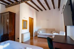 Postel nebo postele na pokoji v ubytování Villa Vittoria Hotel