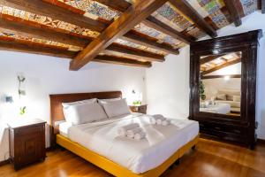 Postel nebo postele na pokoji v ubytování Villa Vittoria Hotel