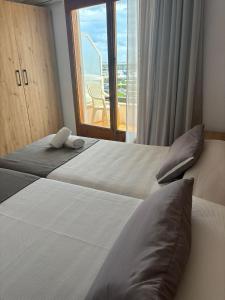 Postel nebo postele na pokoji v ubytování Hostal Santa Clara