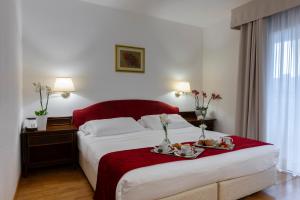 Postel nebo postele na pokoji v ubytování Hotel Hannover