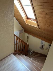 a skylight in a house with a staircase at Ferienwohnung Hänel in Antonshöhe