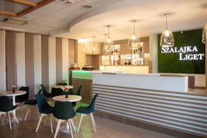 Posezení v ubytování Szalajka Liget Hotel és Apartmanházak