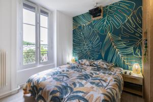 Postel nebo postele na pokoji v ubytování Rétro movies studio