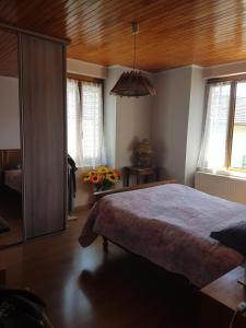 Postel nebo postele na pokoji v ubytování ludo