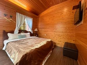 Postel nebo postele na pokoji v ubytování House of Ahan