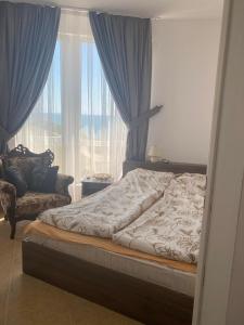 Un pat sau paturi într-o cameră la Aparthotel Costa Calma
