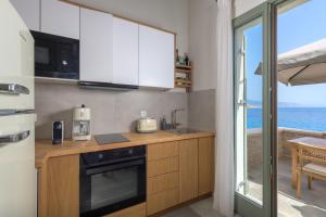 Kuchyň nebo kuchyňský kout v ubytování Onar Residences Chalki