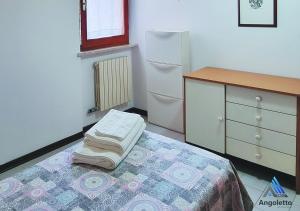 Postel nebo postele na pokoji v ubytování Angoletto Sirolo Affittacamere