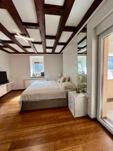 מיטה או מיטות בחדר ב-Luxury Villa Kadic