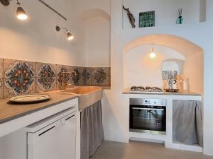 Kuchyňa alebo kuchynka v ubytovaní Casa Battiato