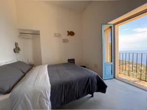 Posteľ alebo postele v izbe v ubytovaní Casa Battiato