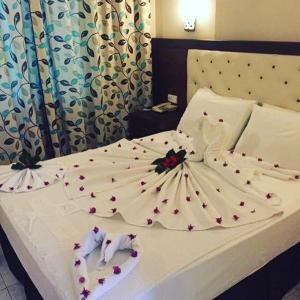 Кровать или кровати в номере Ozturk Apart Hotel