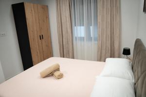 Ένα ή περισσότερα κρεβάτια σε δωμάτιο στο Apartment Nada