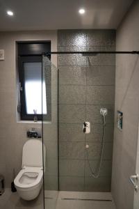 Ένα μπάνιο στο Apartment Nada
