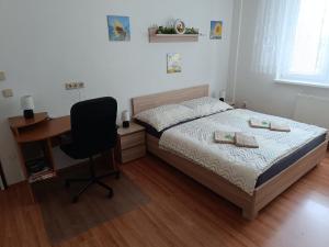 Postel nebo postele na pokoji v ubytování Prázdninové ubytování - celý byt jen Váš