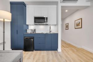 Η κουζίνα ή μικρή κουζίνα στο INITIAL - DISTRICT - Centre-Ville de Québec