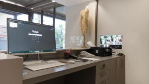 TV a/nebo společenská místnost v ubytování Bomo Suites + 21 fotografií