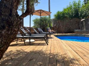 The swimming pool at or close to Ammoudara Bay Villa