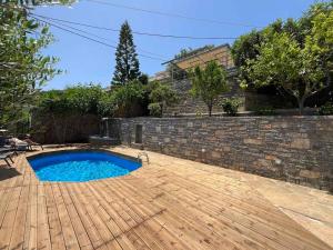 The swimming pool at or close to Ammoudara Bay Villa