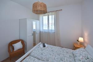 Postel nebo postele na pokoji v ubytování Holiday Home Angela