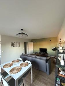 Posezení v ubytování Agréable T2 lumineux 4 couchages tout équipé