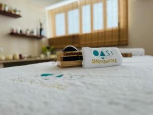 Postel nebo postele na pokoji v ubytování Hotel Premiere