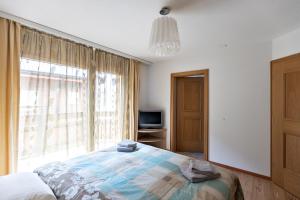 Postel nebo postele na pokoji v ubytování Residenz Ambassador