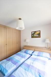 Postel nebo postele na pokoji v ubytování Residenz Ambassador