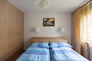Postel nebo postele na pokoji v ubytování Residenz Ambassador