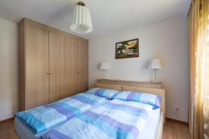 Postel nebo postele na pokoji v ubytování Residenz Ambassador