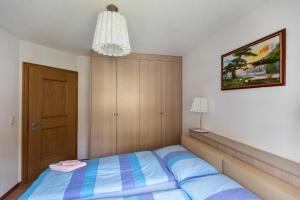 Postel nebo postele na pokoji v ubytování Residenz Ambassador