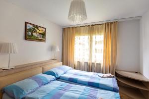 Postel nebo postele na pokoji v ubytování Residenz Ambassador