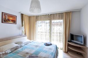 Postel nebo postele na pokoji v ubytování Residenz Ambassador